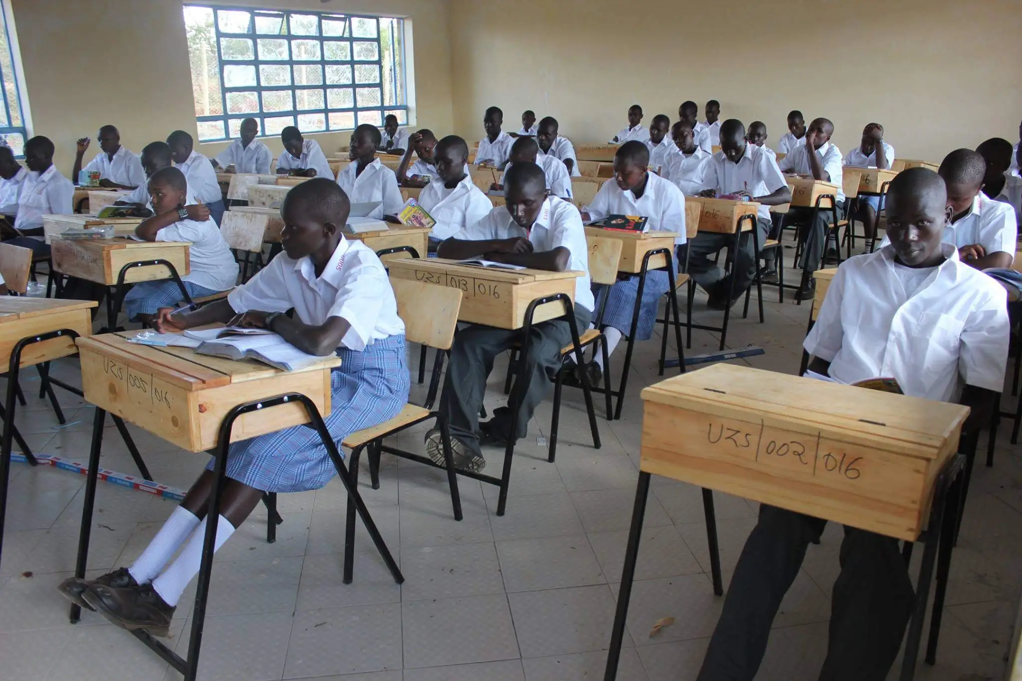 Students in classroom at Uzalendo School